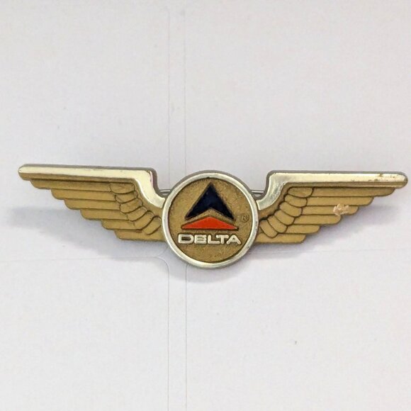 Vintage STOFFEL SEALS Delta Airlines Wings Aviation Kids Pin - Picture 1 of 4